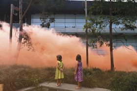 Rebecca Baumann, Smoke Fields (2012). 75 smoke canisters, 4125m3 coloured smoke, electronic igniters. 10 minute performance. Image: Brodie Standen